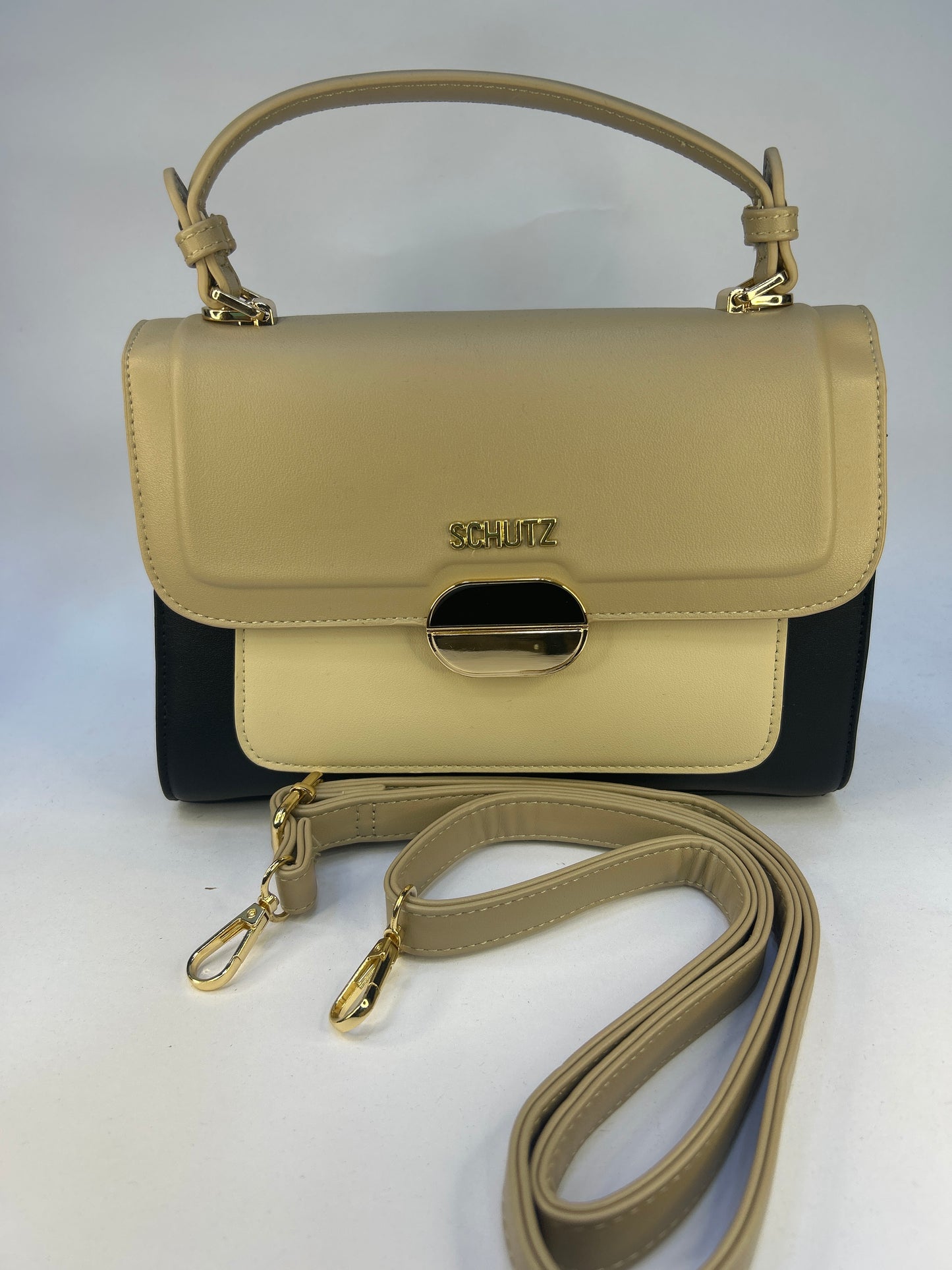 Bolsa de mão com alça transversal